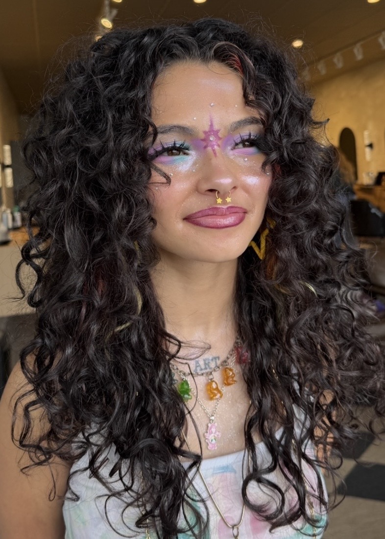 Long dark curls photographed at Ciara Monèt’s Sarasota salon
